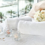 Massage set with roses, essential oil