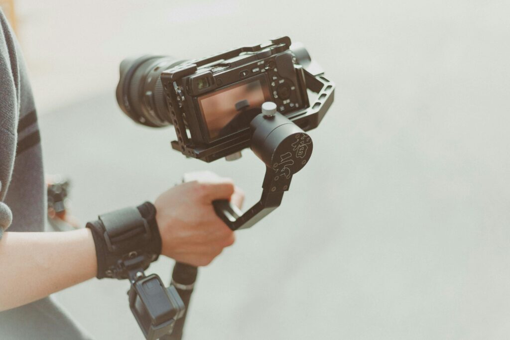 Profesional camera being held by hand