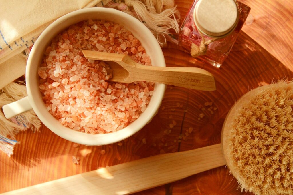 Holistic self-care, Himalayan pink salt, body brush and body oil promoting health