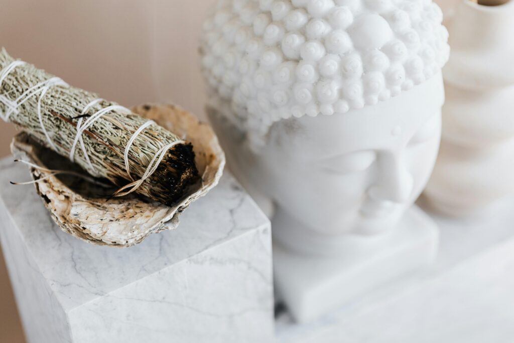 Morning routine for meditation with Buddha statue and smoke incense