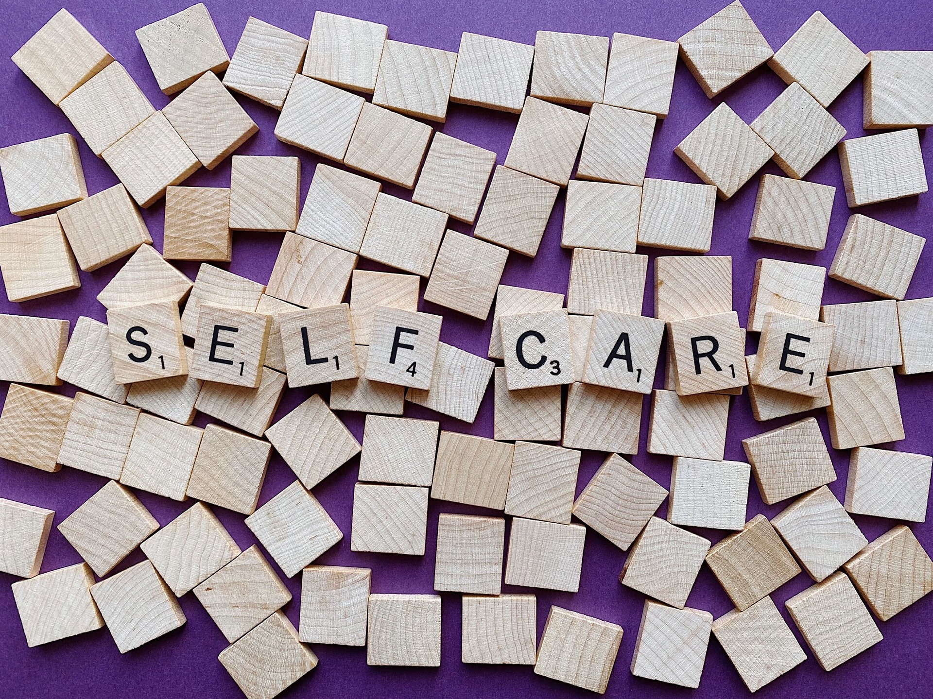 Self-care letter spread on a purple background