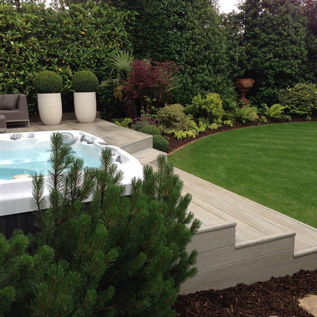 Spa at home , jacuzzi outside and tree and green grass