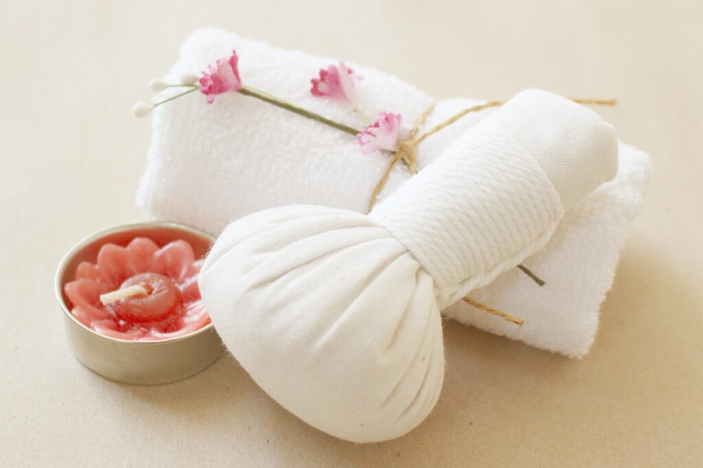 Spa items for massage towel and candle