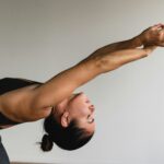 Lady practicing nervous system regulation ritual as stretching