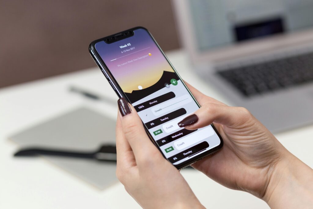 Boocking App for massage therapy business , phone in an office