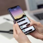 Boocking App for massage therapy business , phone in an office